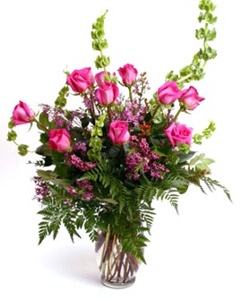 Roses mixed with Bells of Ireland and Wax Flower