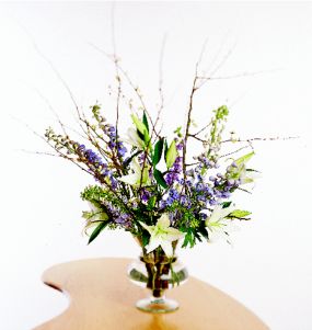 Fragrant white Oriental Lilies and tall Delphinium